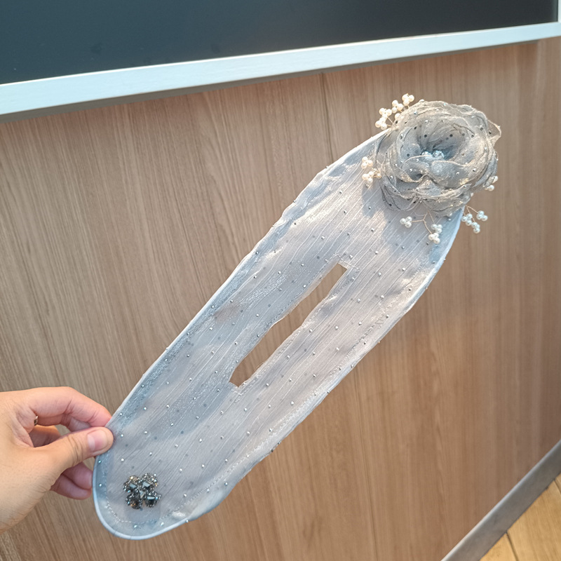 Elegant Hair Bun Maker with Decorative Flower Design