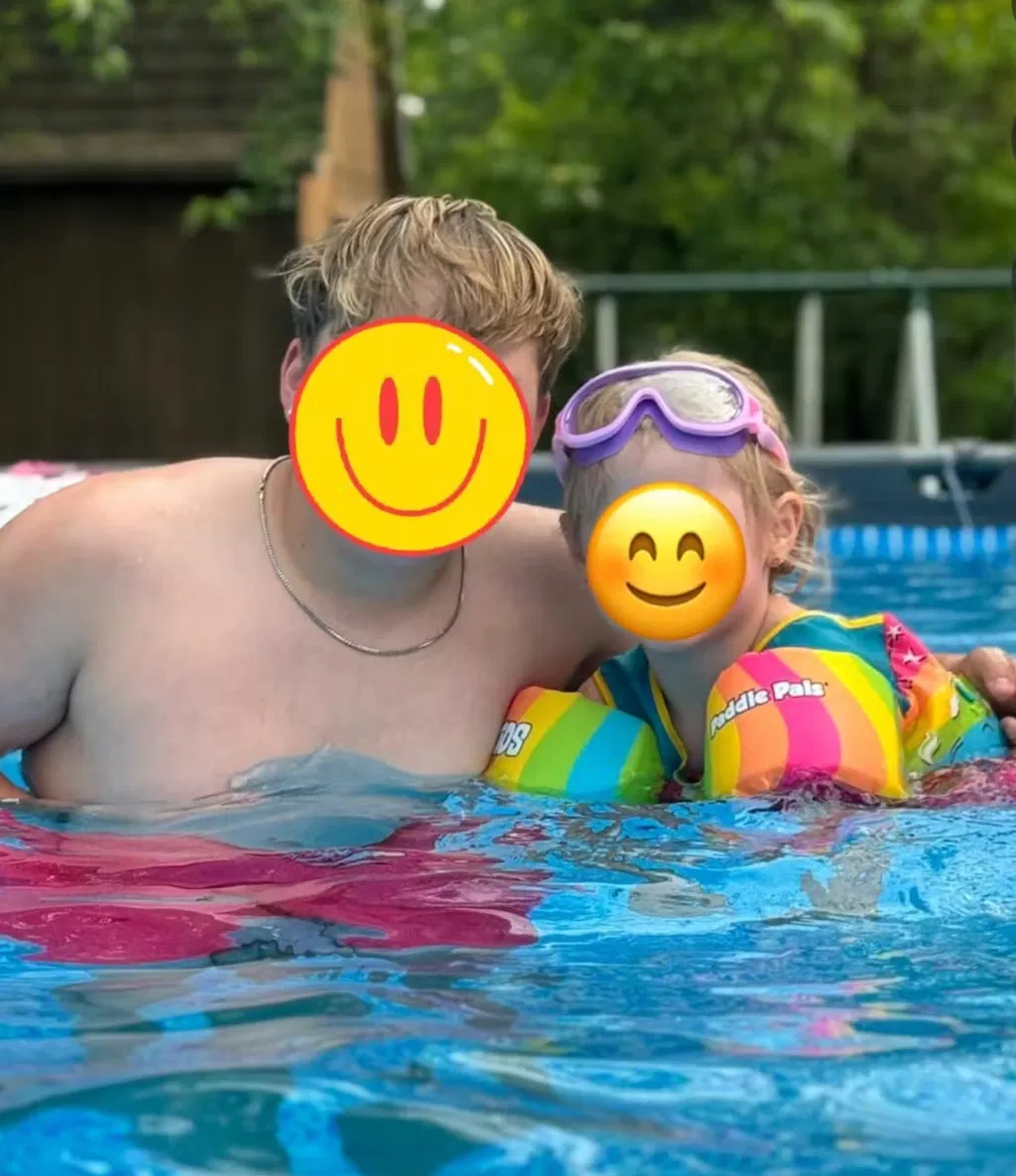 Little girl wearing splashyeyes swim goggles