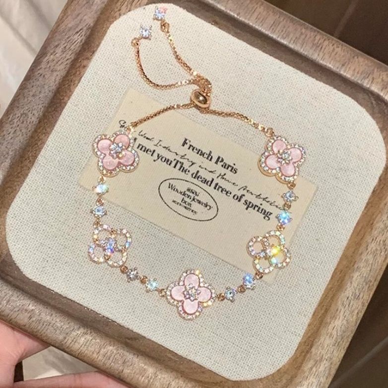 Elegant Pink Clover Crystal Bracelet – Adjustable Gold Chain with Sparkling Flower Charms