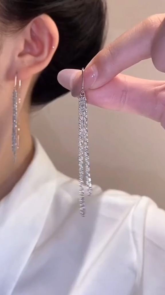 Star tassel earrings with diamonds