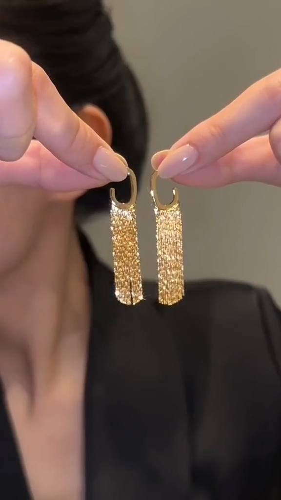 Star tassel earrings with diamonds