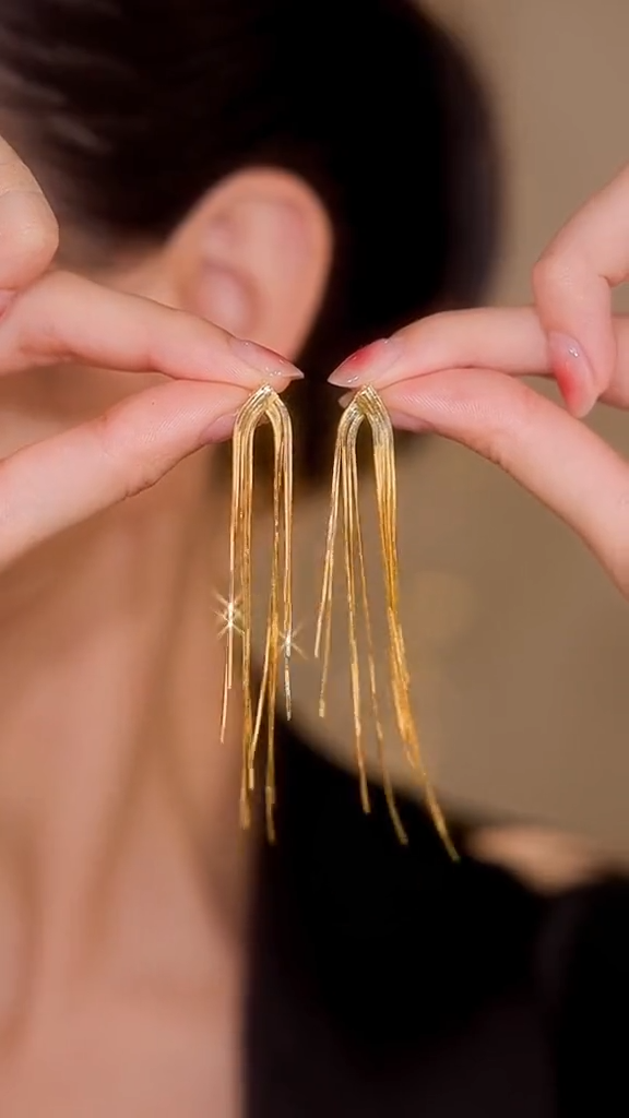 Star tassel earrings with diamonds