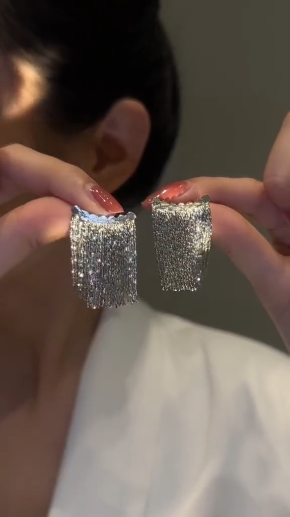 Star tassel earrings with diamonds