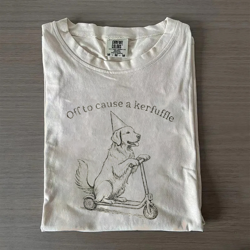 Off to cause a kerfuffle Golden Retriever T-shirt