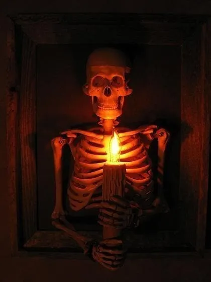 Framed 3D Skeleton Torso Holding Candle💀Haunted house skull
