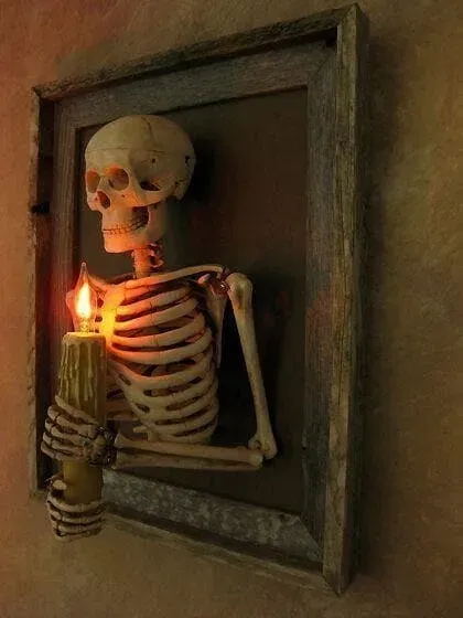 Framed 3D Skeleton Torso Holding Candle💀Haunted house skull