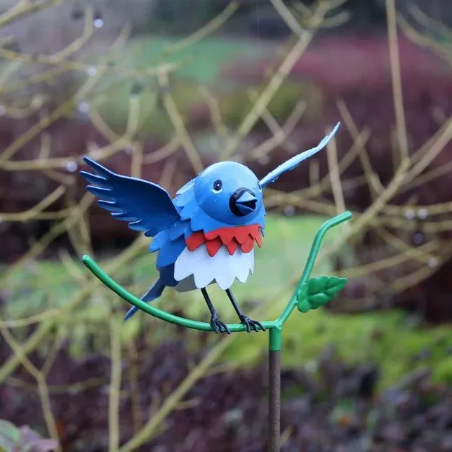 Goldfinch, Cardinal, Western Bluebird, Ruby-throated Hummingbird on a garden stake