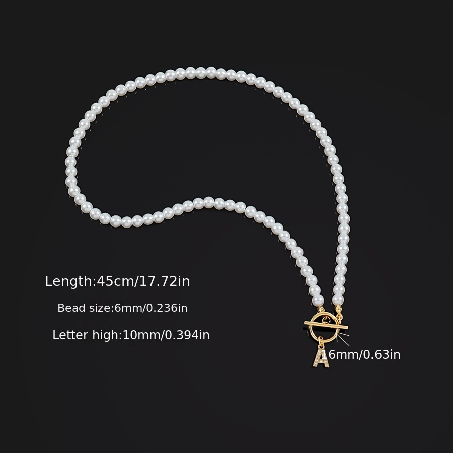 🎁 50% reducere la toate produsele!🌟Colier cu pandantiv cu literă engleză inițială cu zircon colier cu cataramă clasică de perle placat cu aur de 18k💫