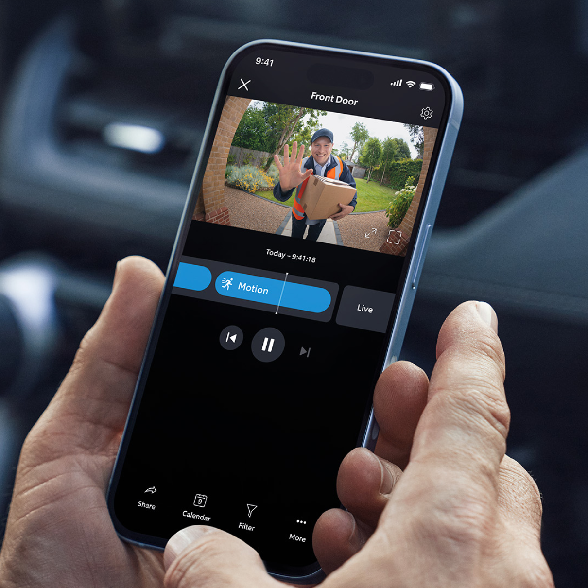 Cell phone screen shows a video recording in the Ring app. 