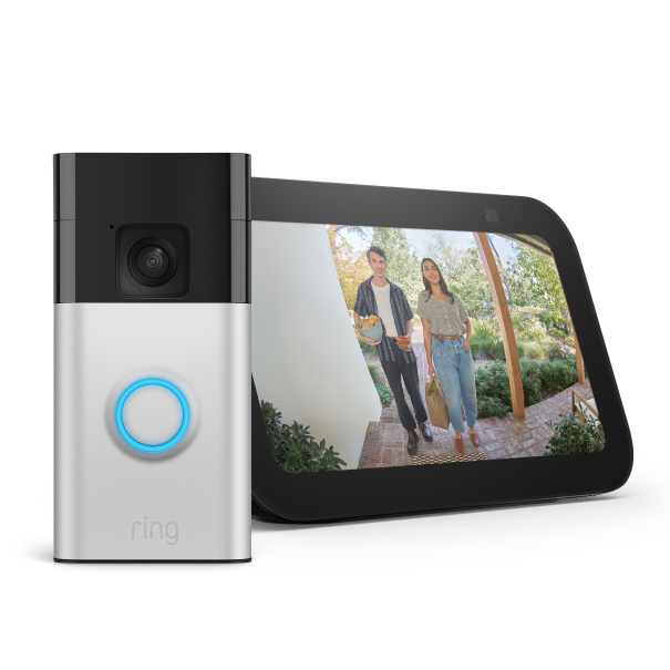 In an empty white background stands a Battery Video Doorbell and an Echo Show. The image of a young couple holding a bowl of snacks is being shown on the screen of the Echo Show.
