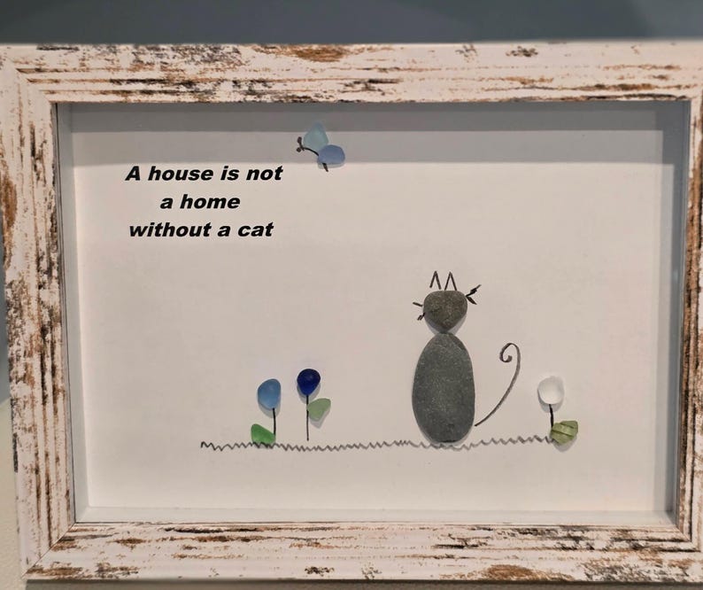 A House is not a home without a cat pebble and sea glass art