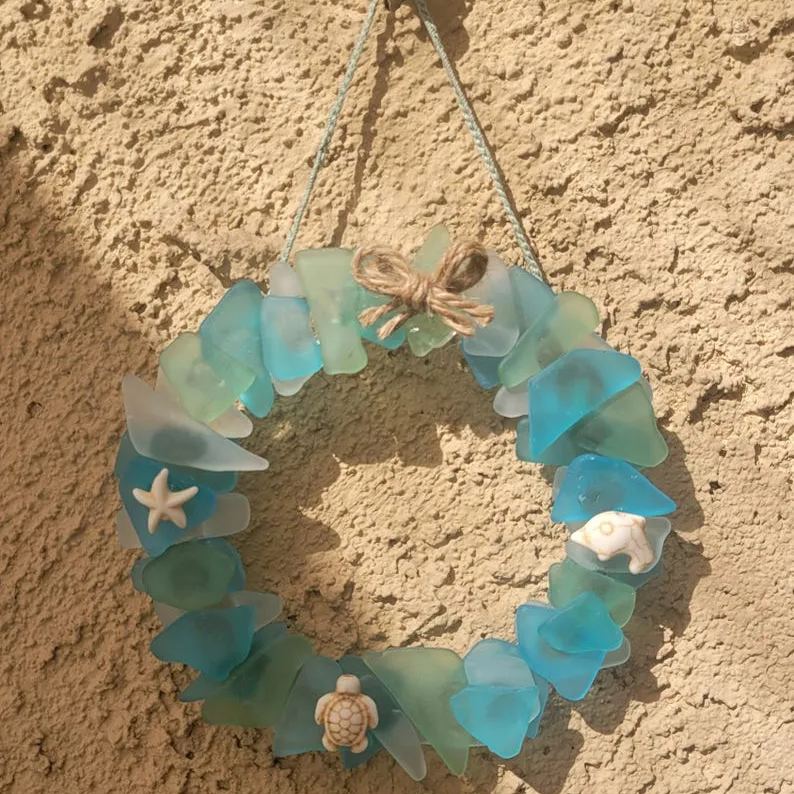 Sea Glass Summer wreath light blue, seafoam green and white embleshed with howlite star fish,sea turtle and dolphin Hangs from matching rope