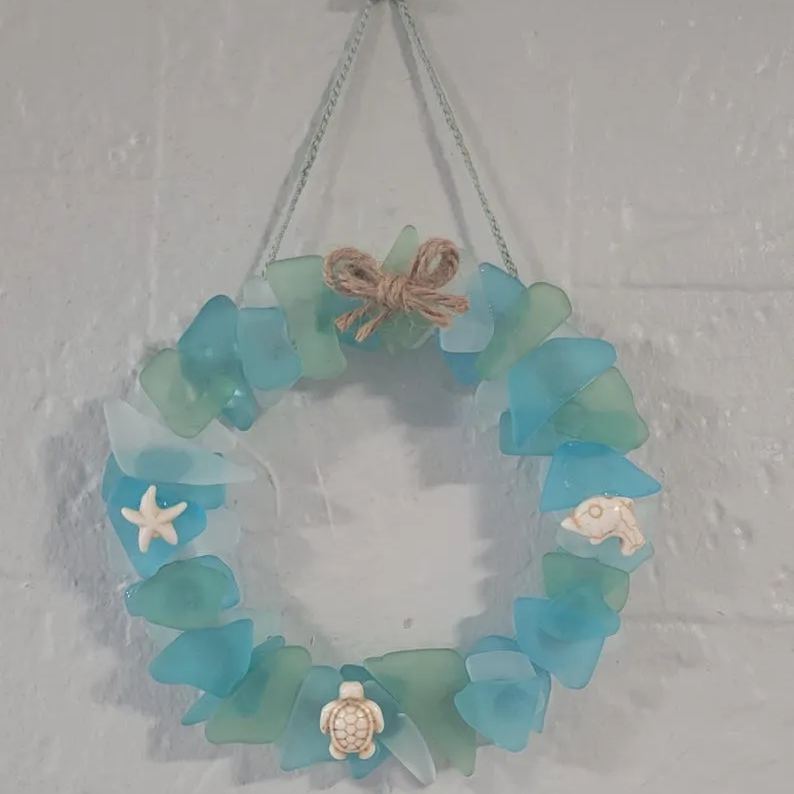Sea Glass Summer wreath light blue, seafoam green and white embleshed with howlite star fish,sea turtle and dolphin Hangs from matching rope