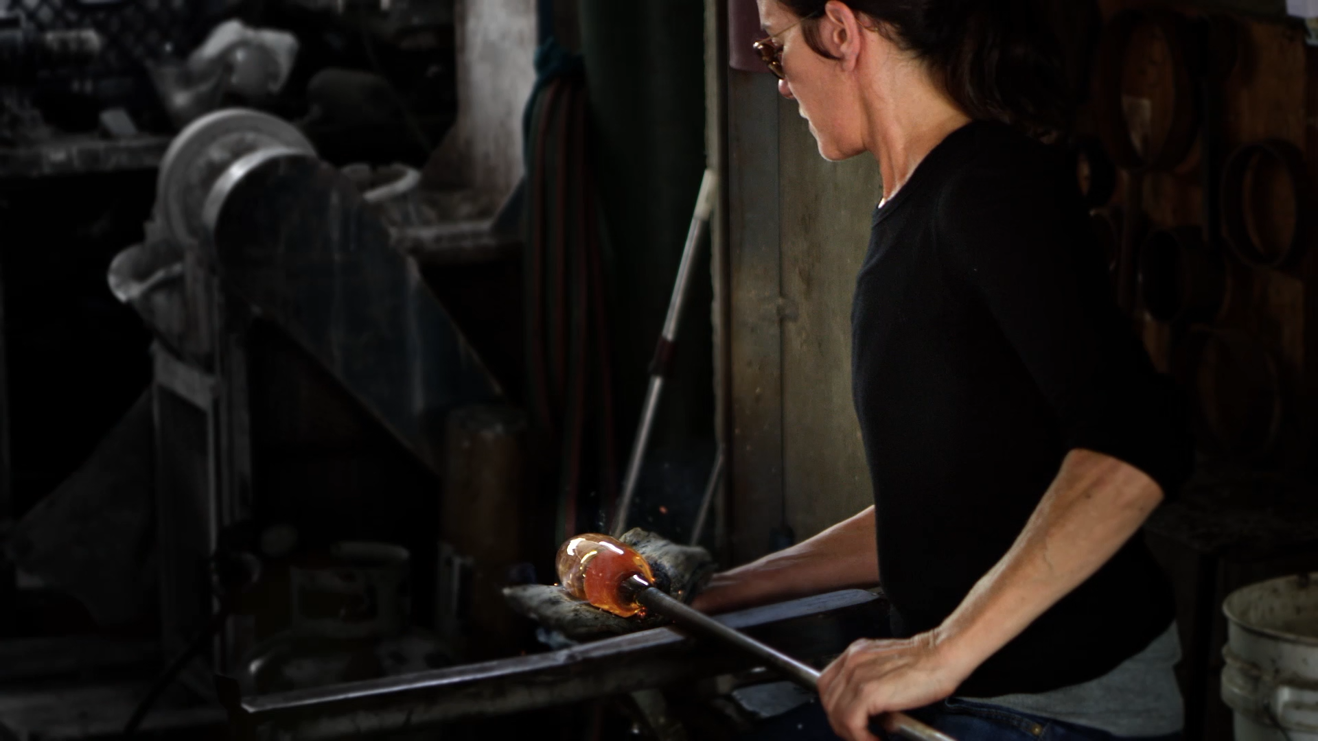 Artisan finishing a custom lighting piece