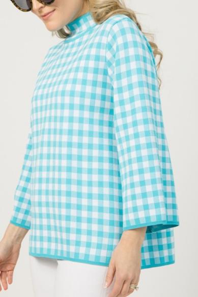 Loose-fitting blue and white checkered top