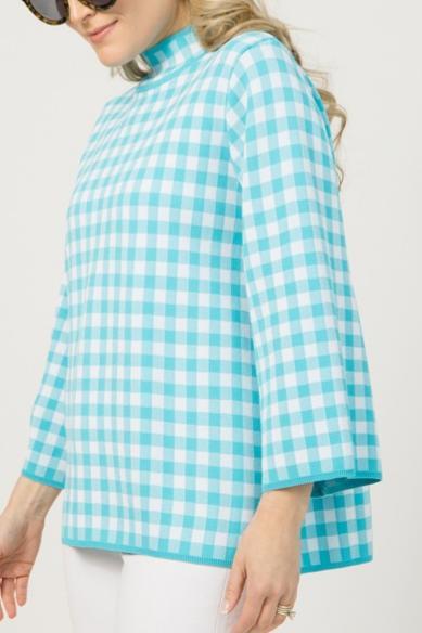Loose-fitting blue and white checkered top
