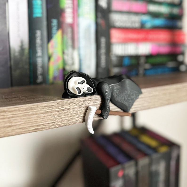 Sleeping Grim Reaper Halloween Bookshelf Decor