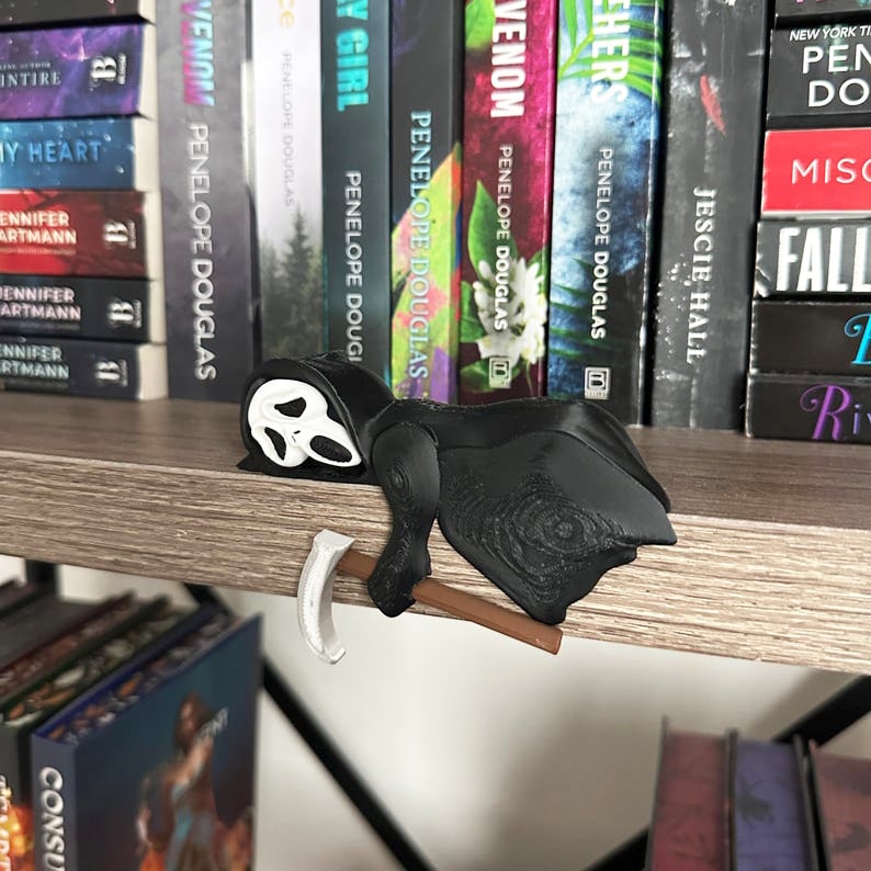 Sleeping Grim Reaper Halloween Bookshelf Decor