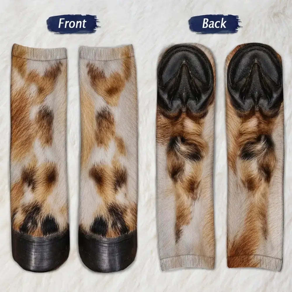 Cow fur patterned socks shown from front and back with black hoof toes on a fluffy white background