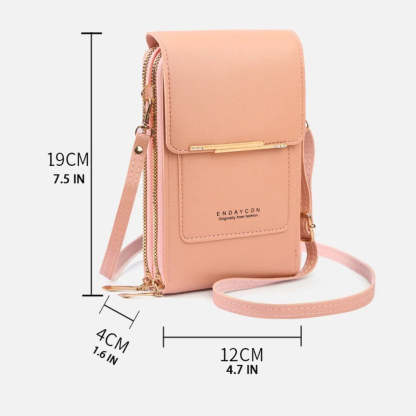A pink leather crossbody phone bag with size dimensions marked in centimeters and inches on a white background