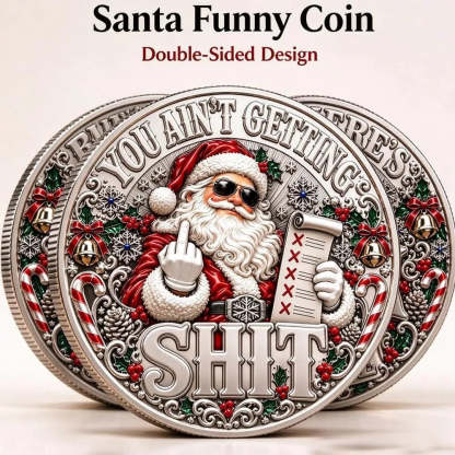 Close-up view of Santa artwork and lettering on the novelty coin