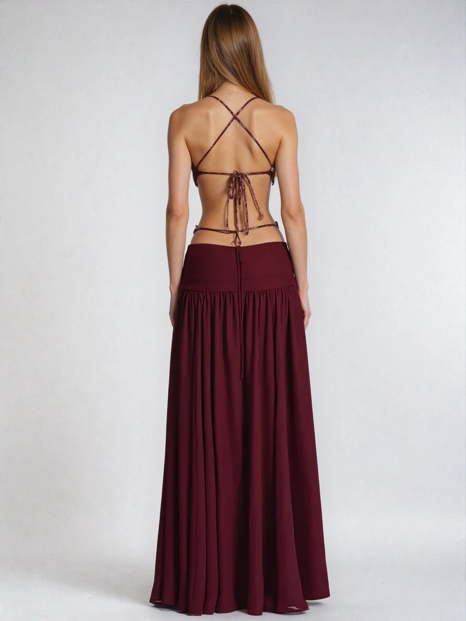 Shakira – Dramatic maxi dress with metal buckle and high slit