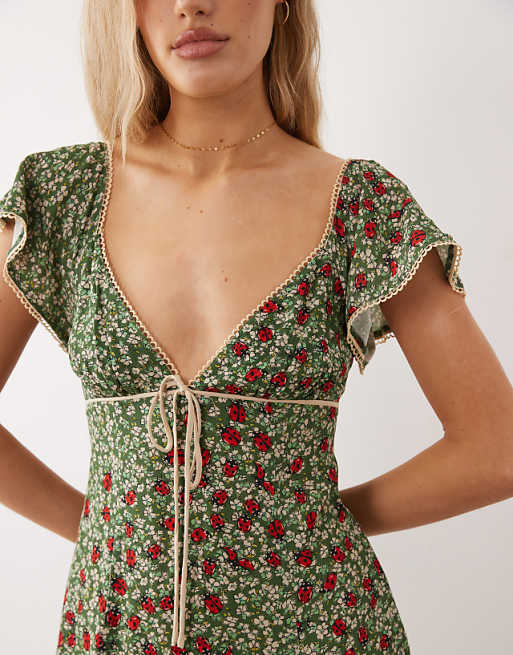 Free People backroads flippy mini dress in green floral