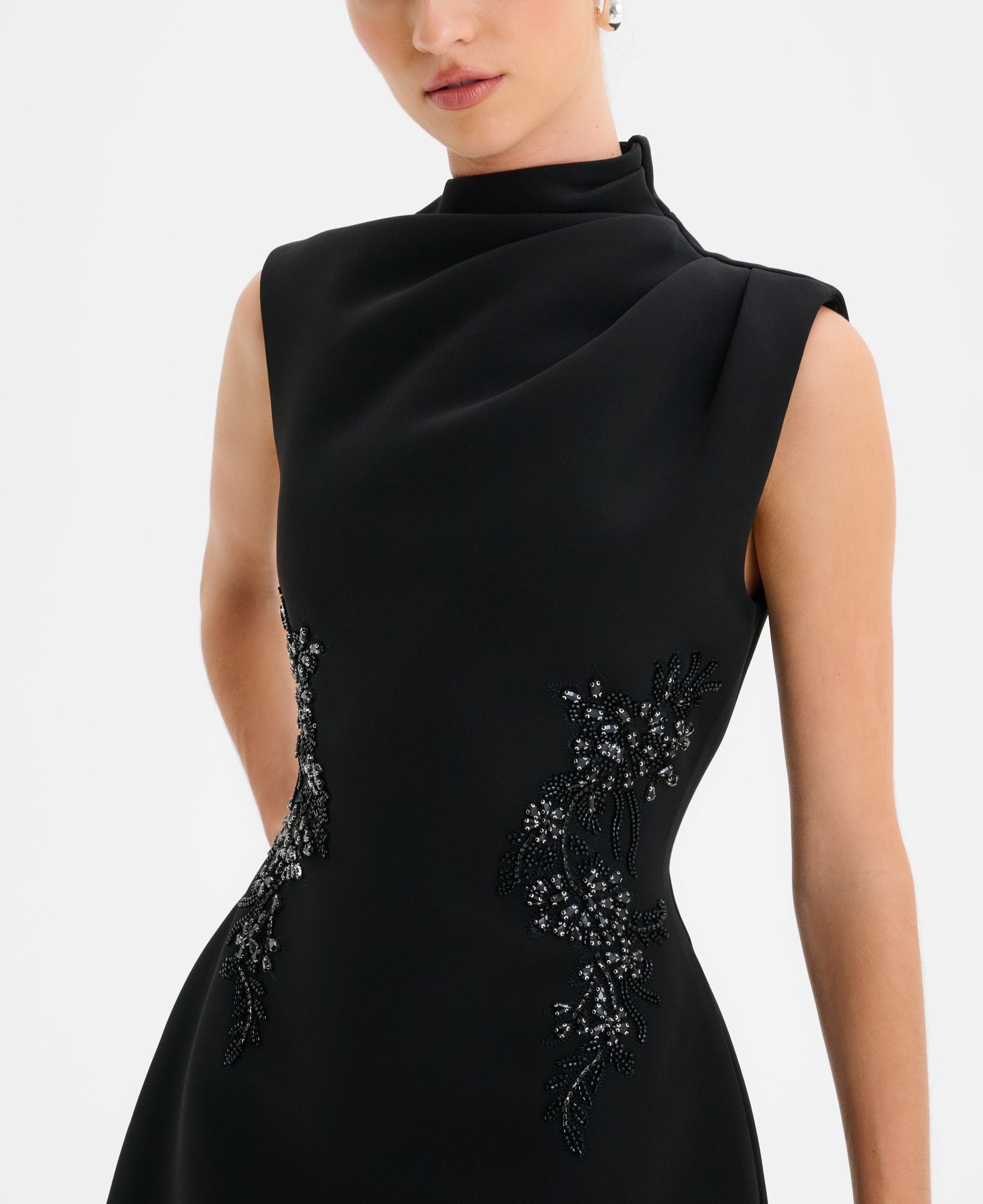 Asymmetric High Neck Embellished Tulip Mini Dress in Black