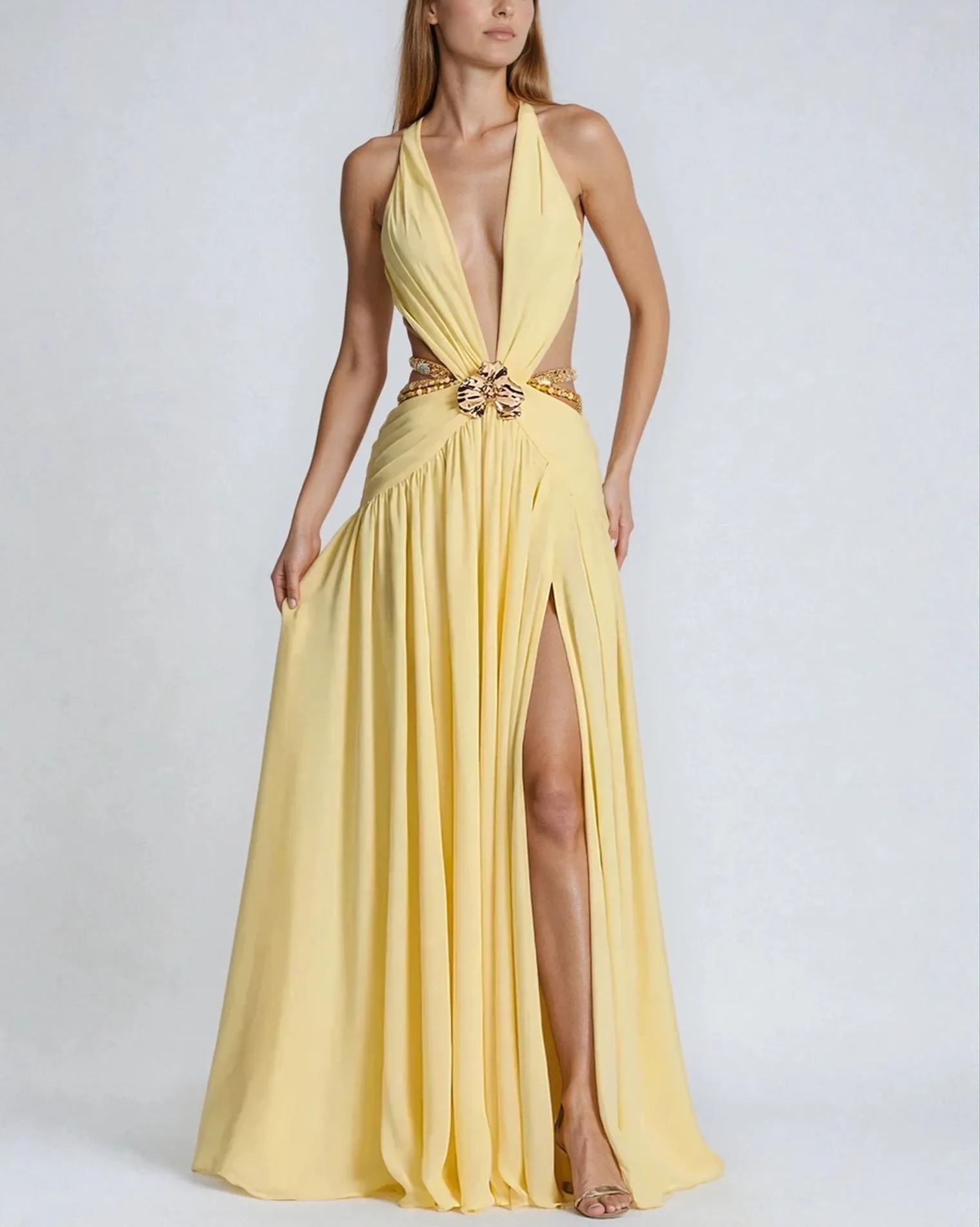 Shakira – Dramatic maxi dress with metal buckle and high slit