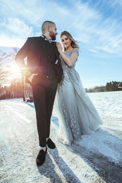 Chic Off-Shoulder Tulle Mermaid Wedding Dress with Detachable Train