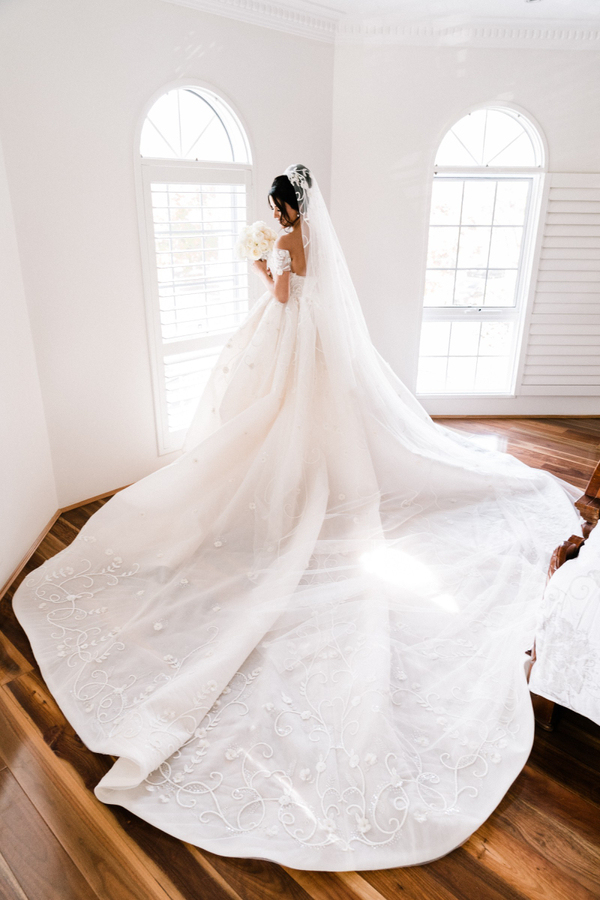Glamorous Off-Shoulder Ball Gown Wedding Dress with Appliques Sweep Train
