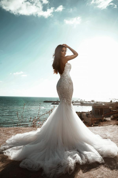 Stunning Sweetheart Beaded Mermaid Sleeveless Tulle Wedding Dress