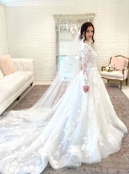 Chicloth Long Sleeves Appliques Wedding Dress High Neck