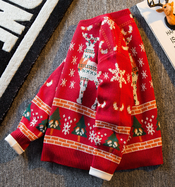 Reindeer, snowflakes and trees Sweater