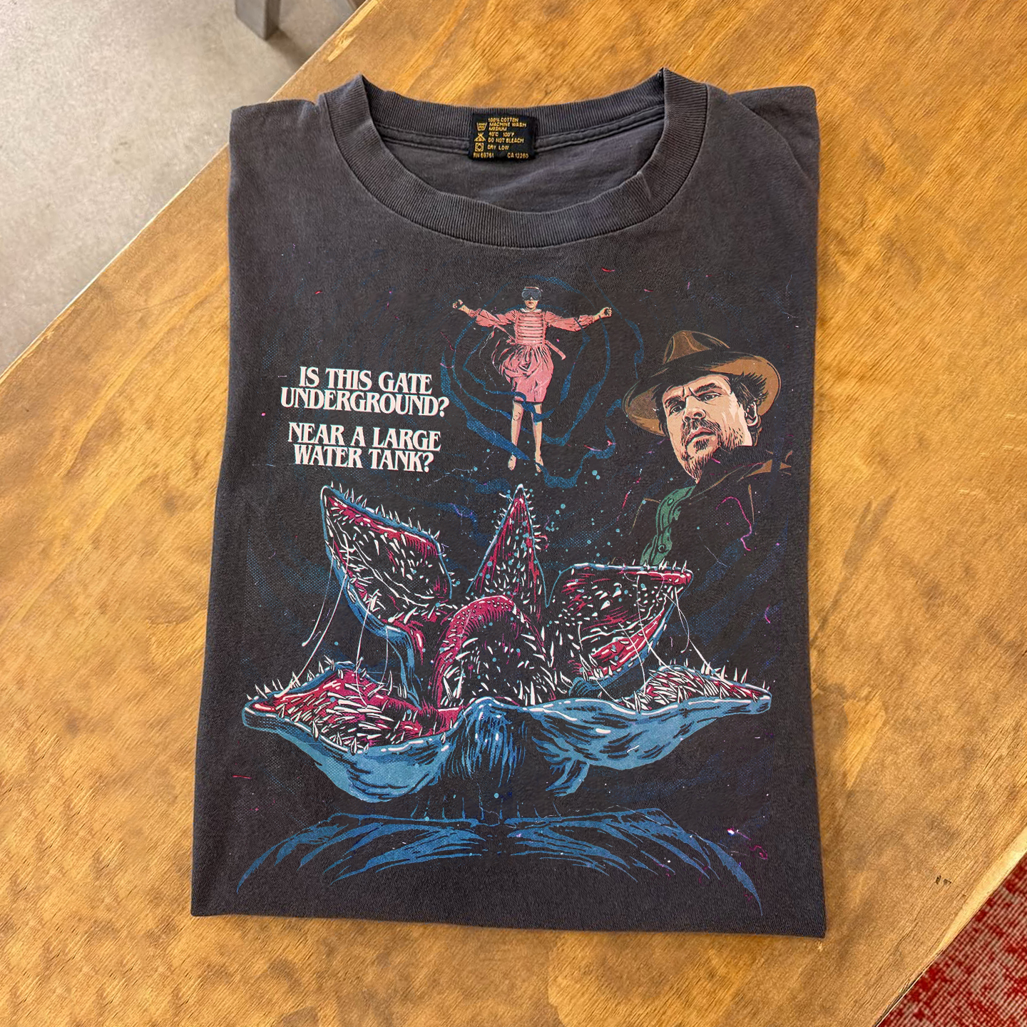 Is This Gate Underground? Near A Large Water Tank? cotton T-shirt