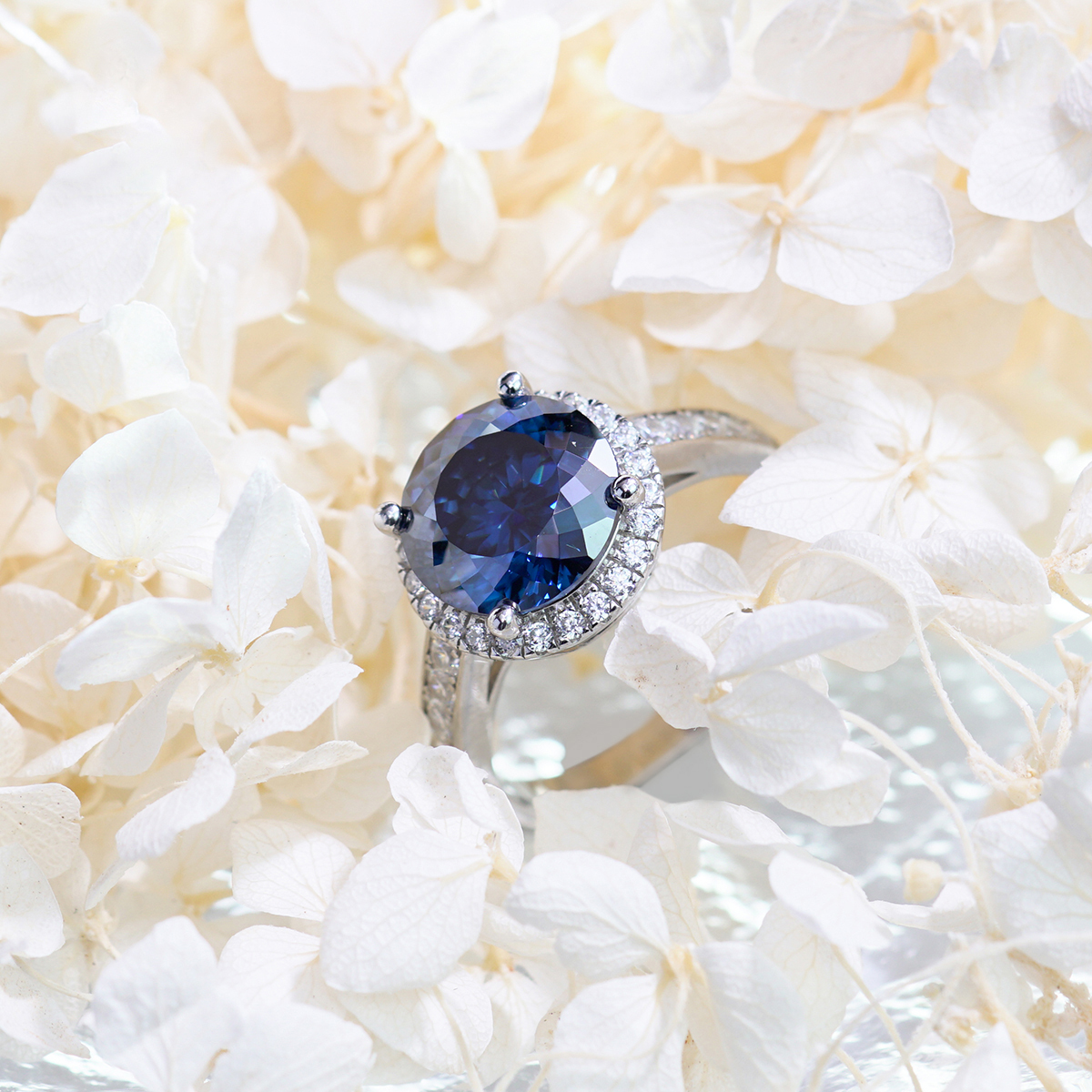 Hundreds Faces Round Synthetic Moissanite Halo Ring In 925 Sterling Silver