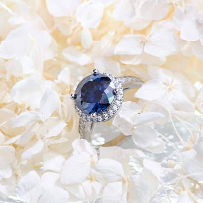 Hundreds Faces Round Synthetic Moissanite Halo Ring In 925 Sterling Silver