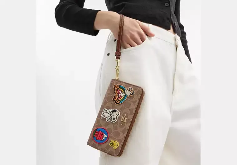 Coach X Peanuts Long Zip Around Wallet In Signature Canvas With Patches