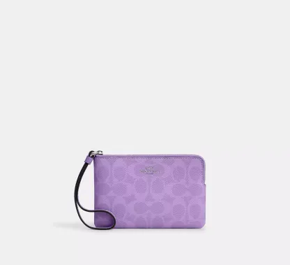 Corner Zip Wristlet In Signature Canvas