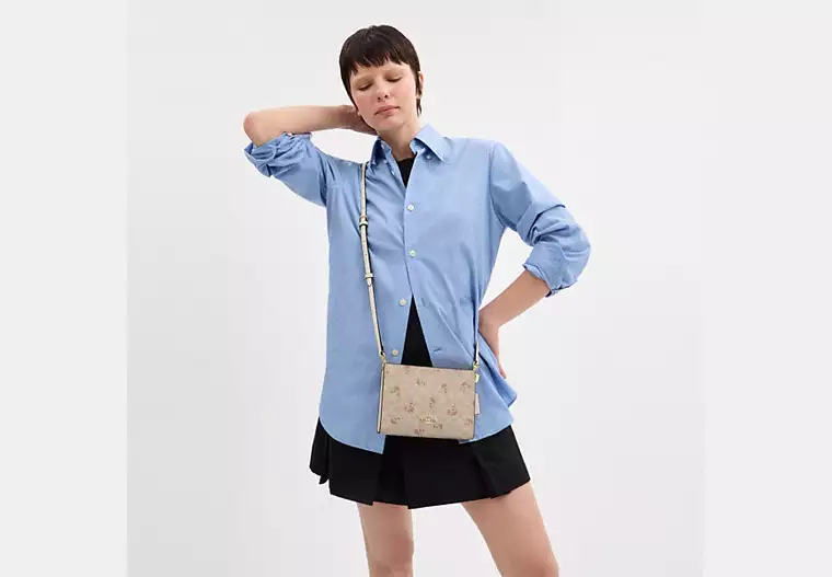 Slim Crossbody Bag In Signature Canvas With Floral Print