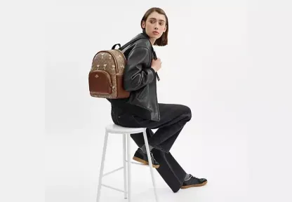 Coach X Peanuts Court Backpack In Signature Canvas With Snoopy Print