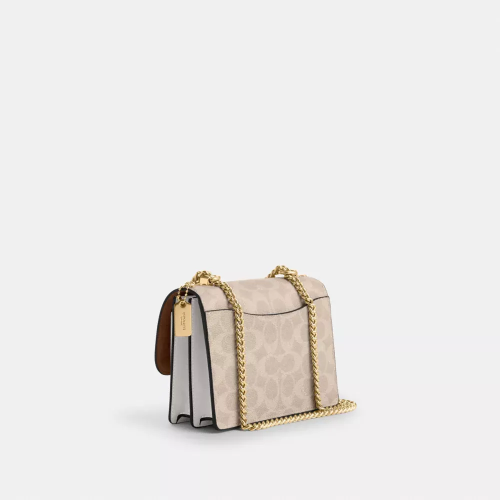 Mini Klare Crossbody Bag In Signature Canvas