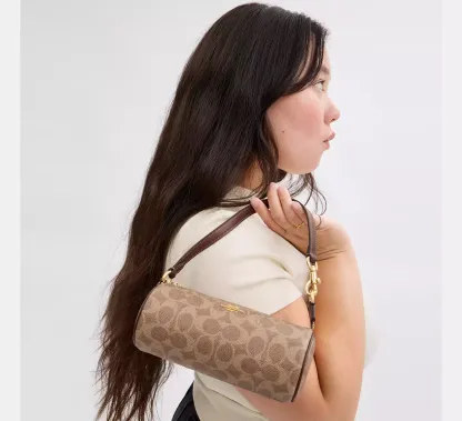 Nolita Barrel Bag In Signature Canvas