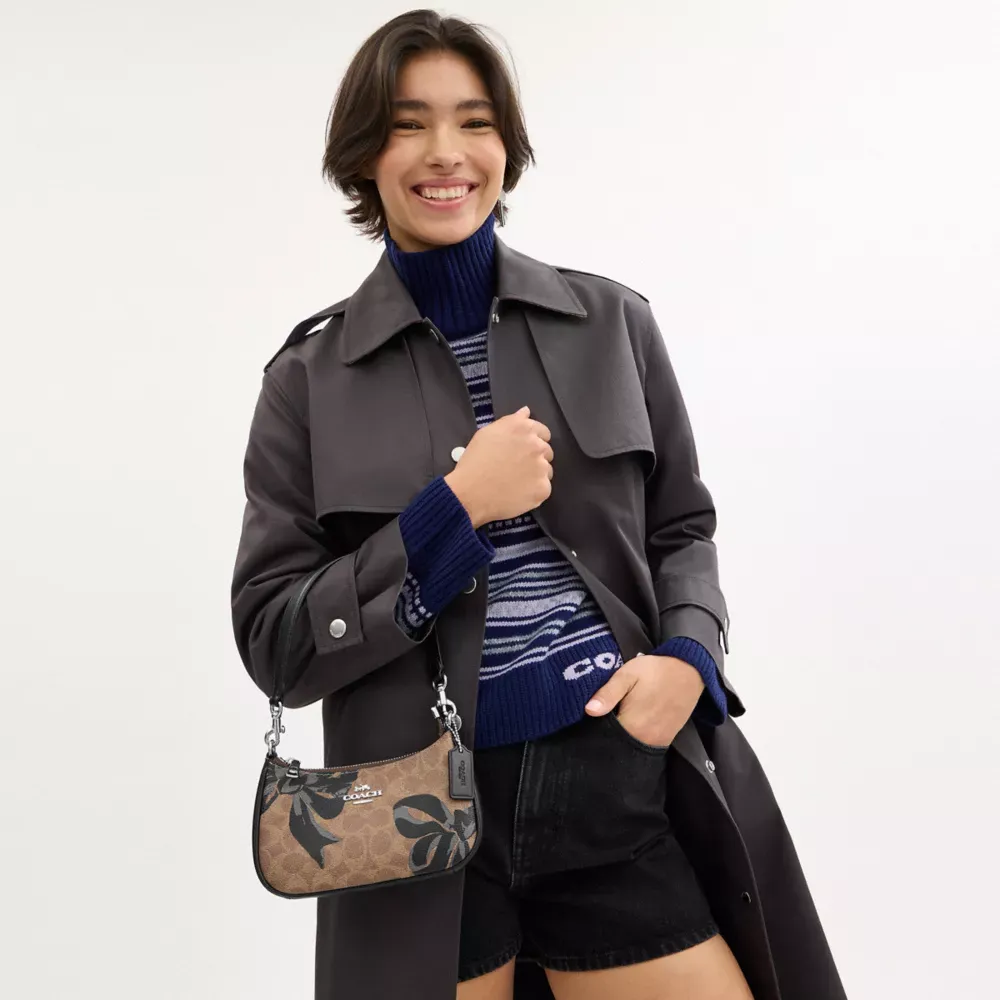 Teri Mini Crossbody Bag In Signature Canvas With Bow Print