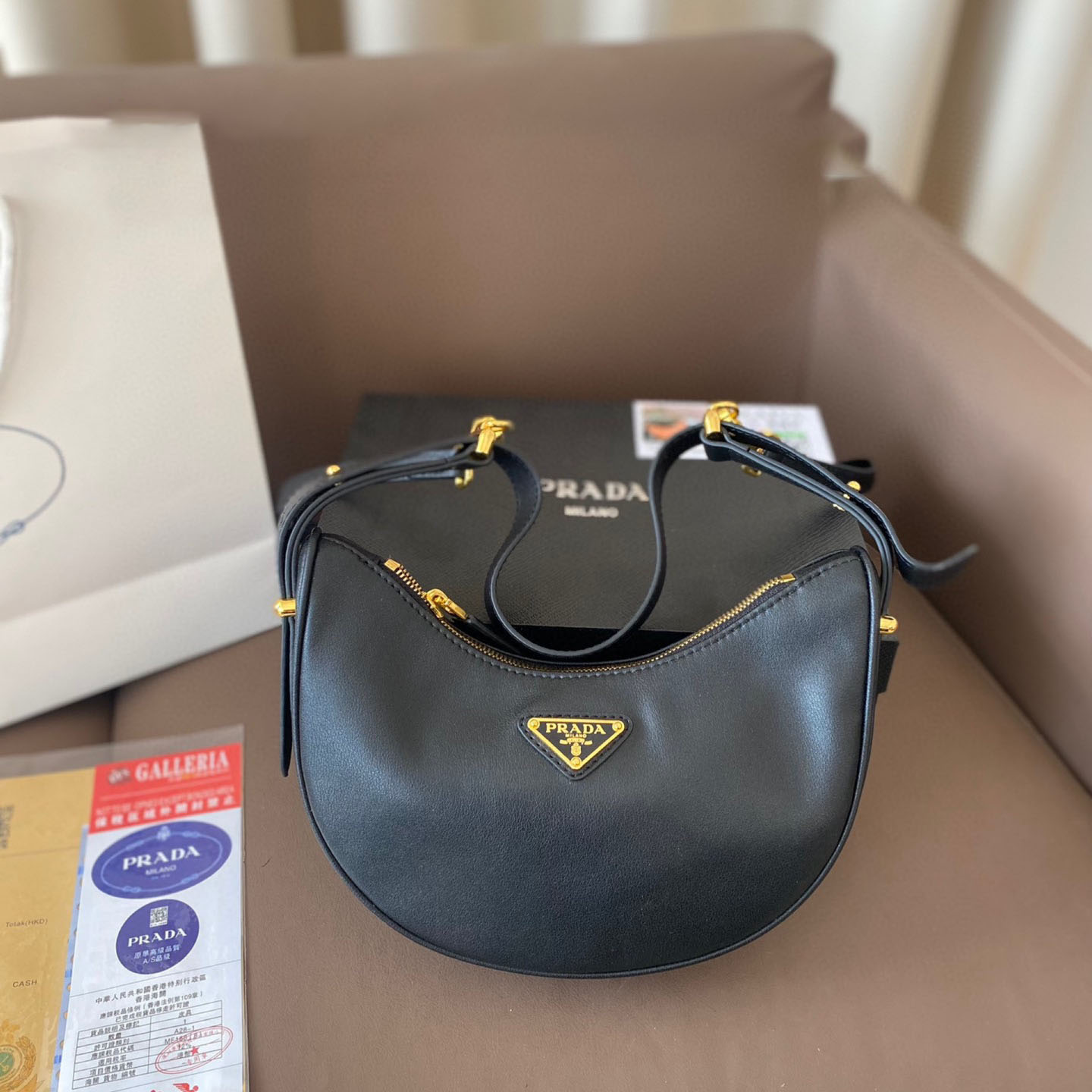 Arqué small leather shoulder bag