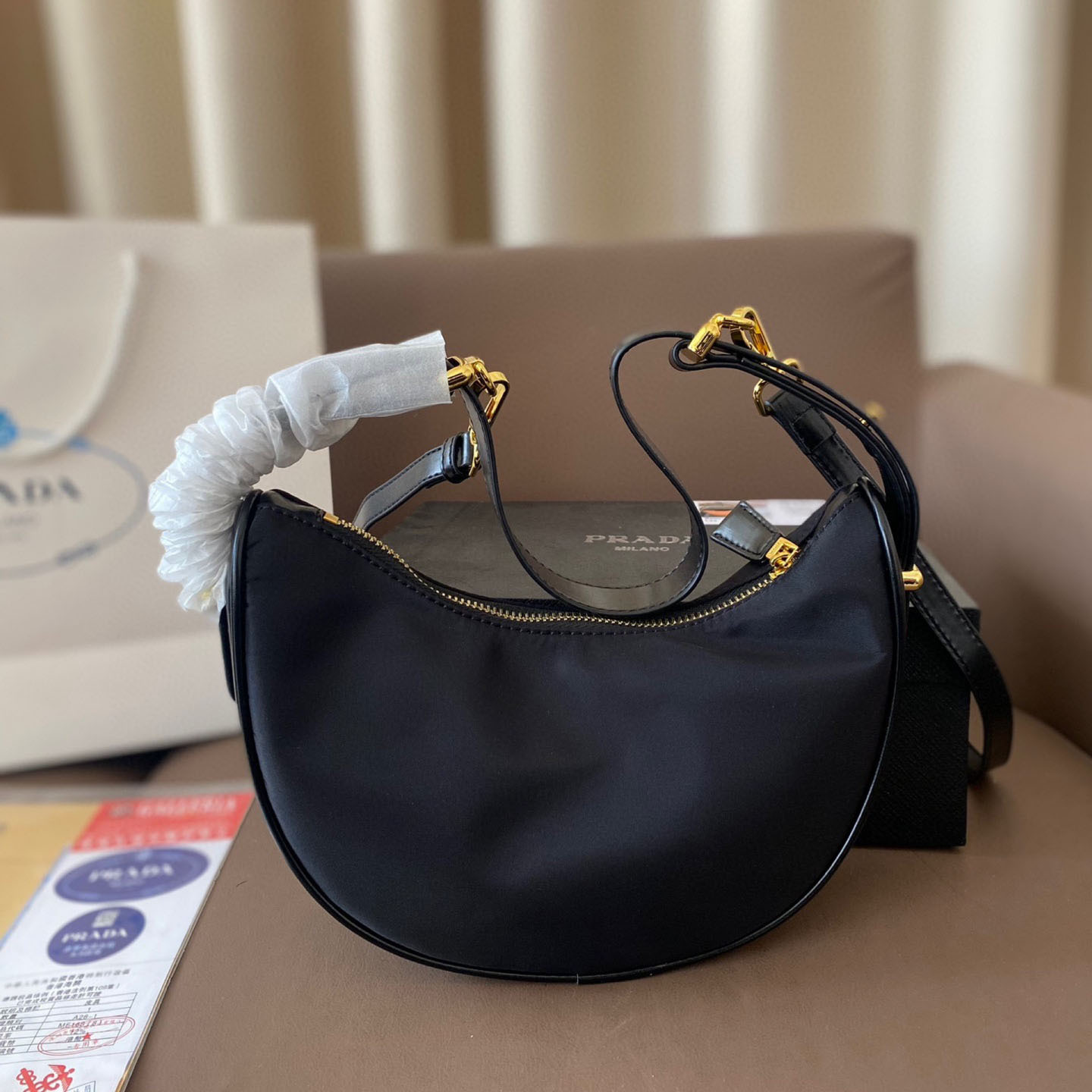 Arqué small leather shoulder bag