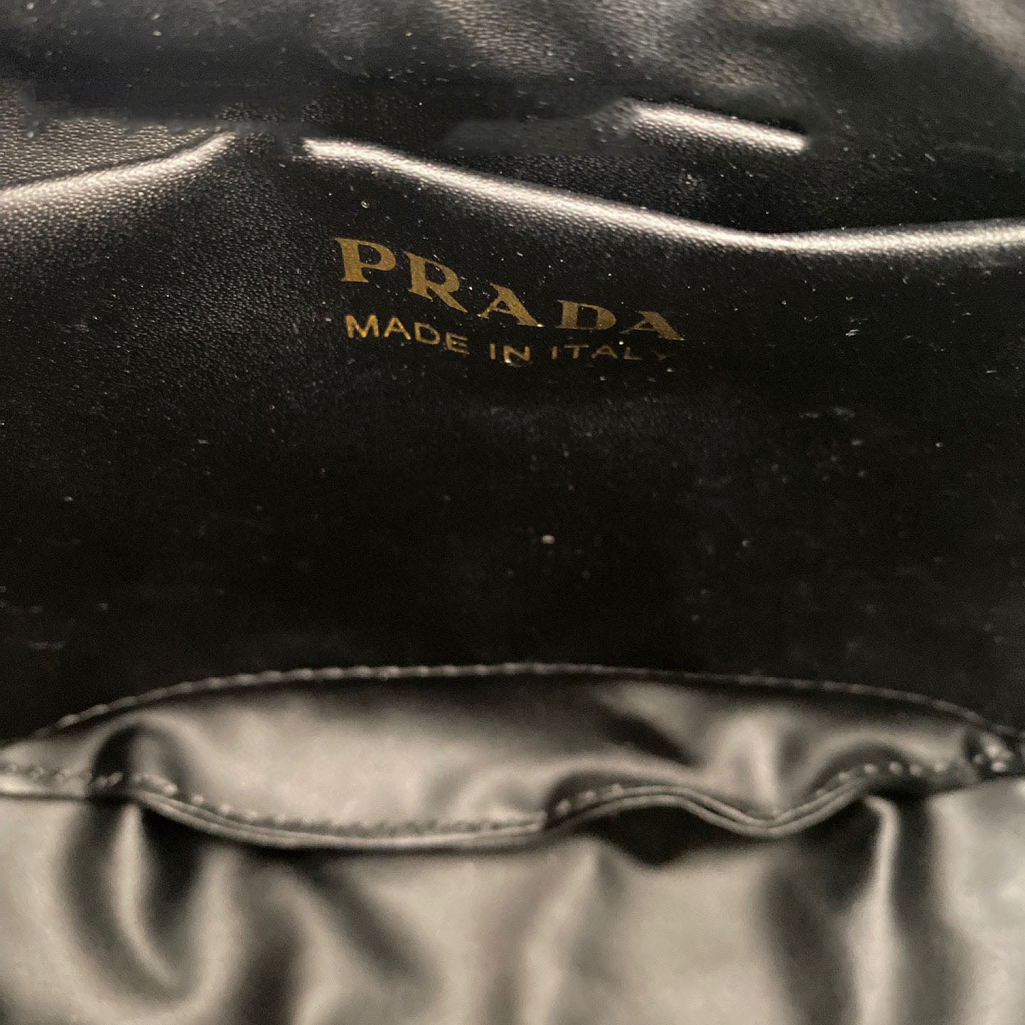 Arqué small leather shoulder bag