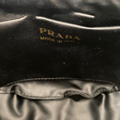 Arqué small leather shoulder bag