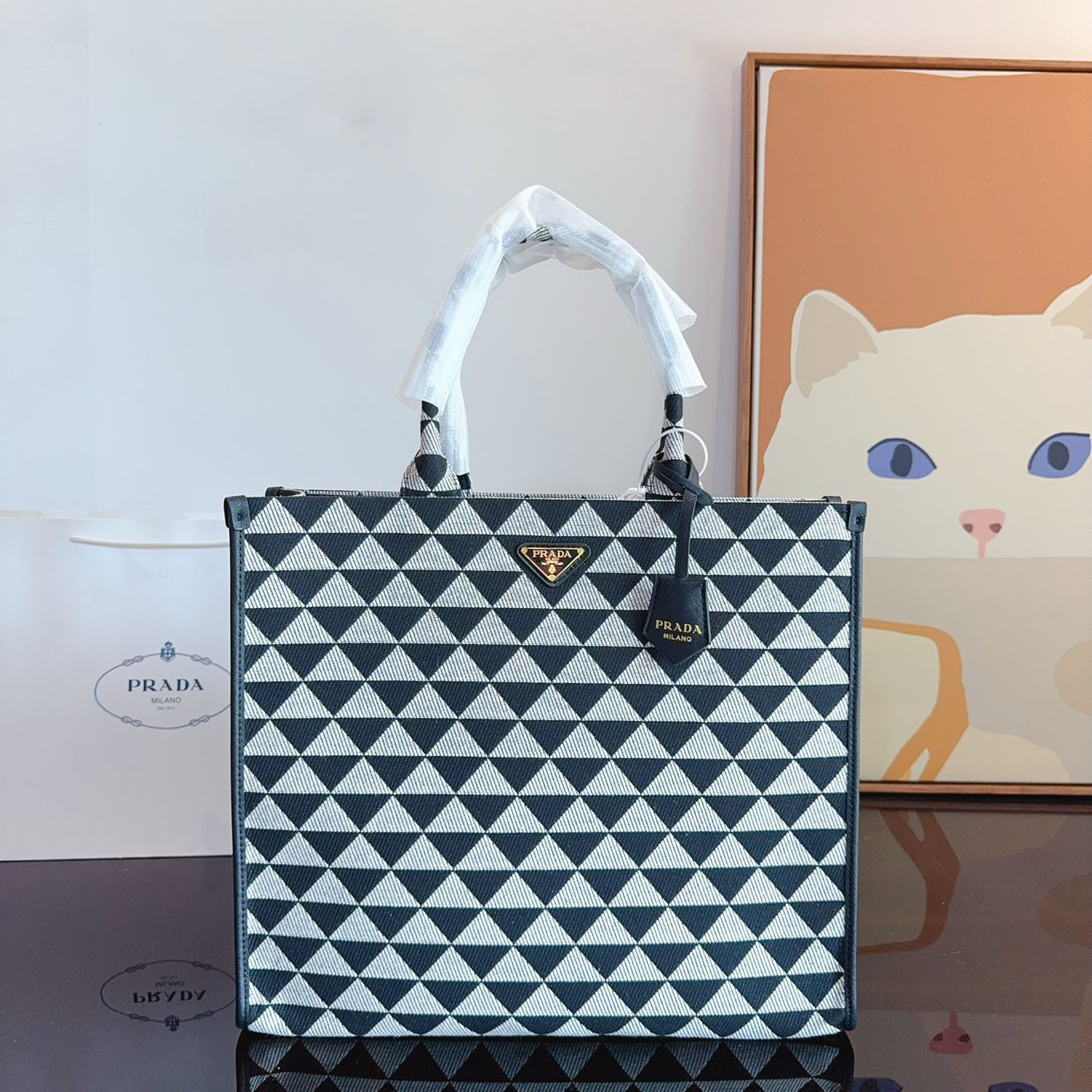 Symbole embroidered fabric handbag