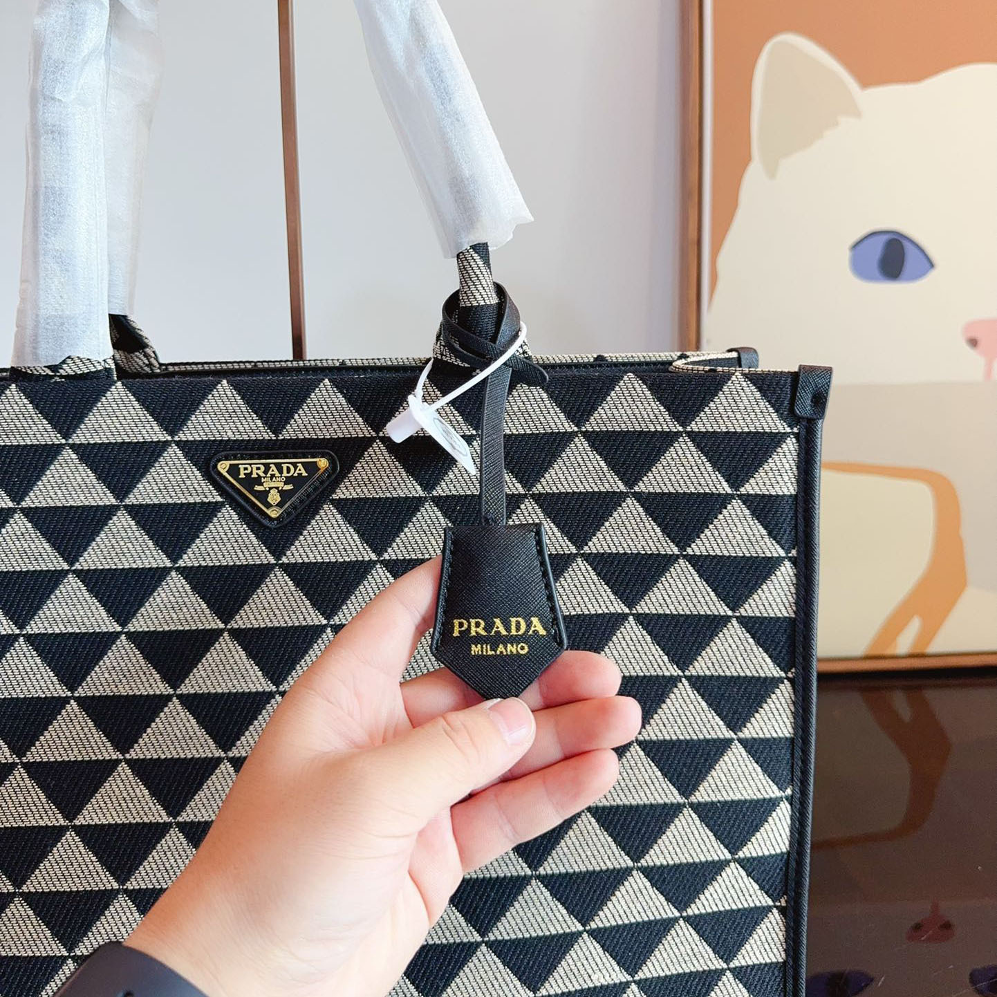 Symbole embroidered fabric handbag